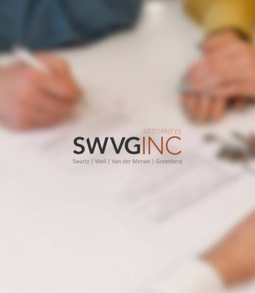 Hands signing property transfer papers with house keys on the table - conveying conveyancing, deeds registration and notarial services.