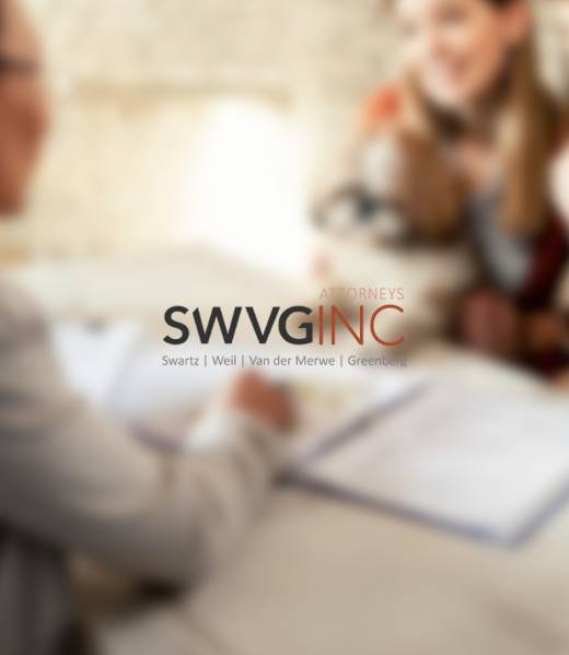 Lawyer meeting with clients over insurance documents, illustrating legal help for disputed claims and policy wording issues.